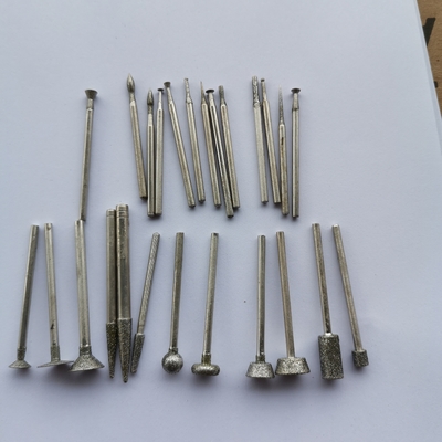 6mmのダイヤモンドの回転式用具のダイヤモンドの釘の頭部の刻み目を取り除く用具のための3mmのすねが付いている回転式ぎざぎざの穴あけ工具