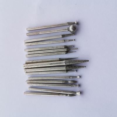 6mmのダイヤモンドの回転式用具のダイヤモンドの釘の頭部の刻み目を取り除く用具のための3mmのすねが付いている回転式ぎざぎざの穴あけ工具